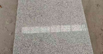 龙岩芝麻白光面毛板